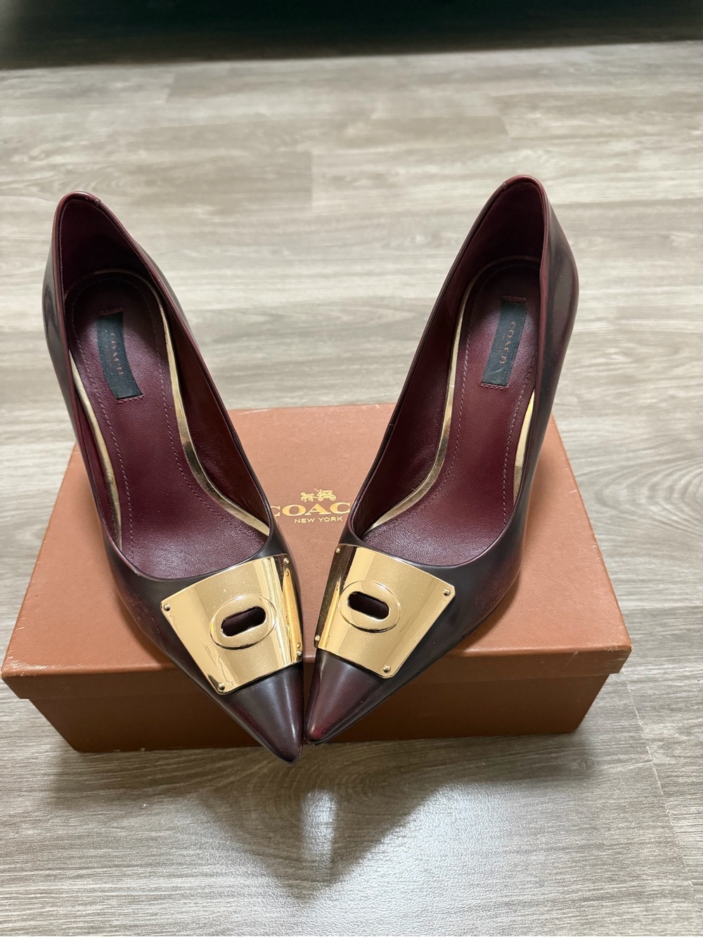 Coach Burgundy Pointed Toe Pumps with Gold Plate Accent